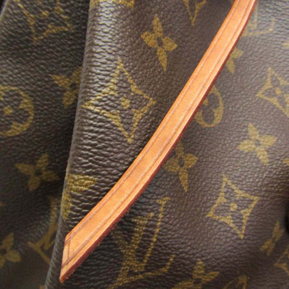 LOUIS VUITTON Brown Monogram Backpack - Picture 8 of 14
